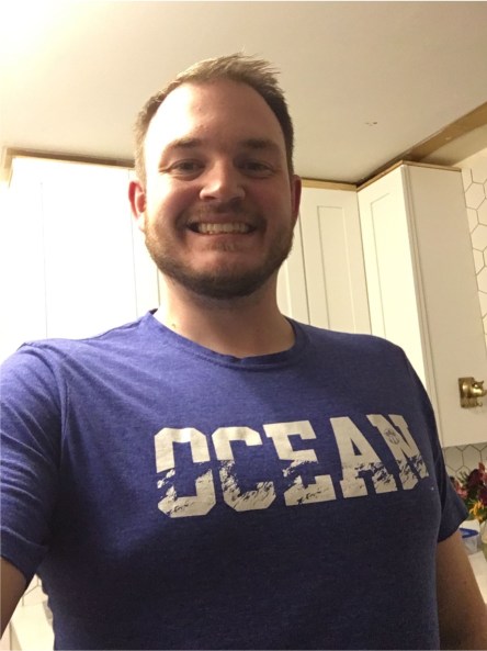 Picture of me wearing a shirt with the word Ocean on it